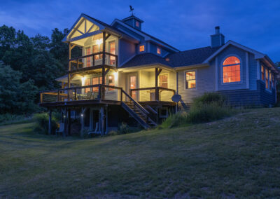 Carlin Hill Farm, exterior at nighttime